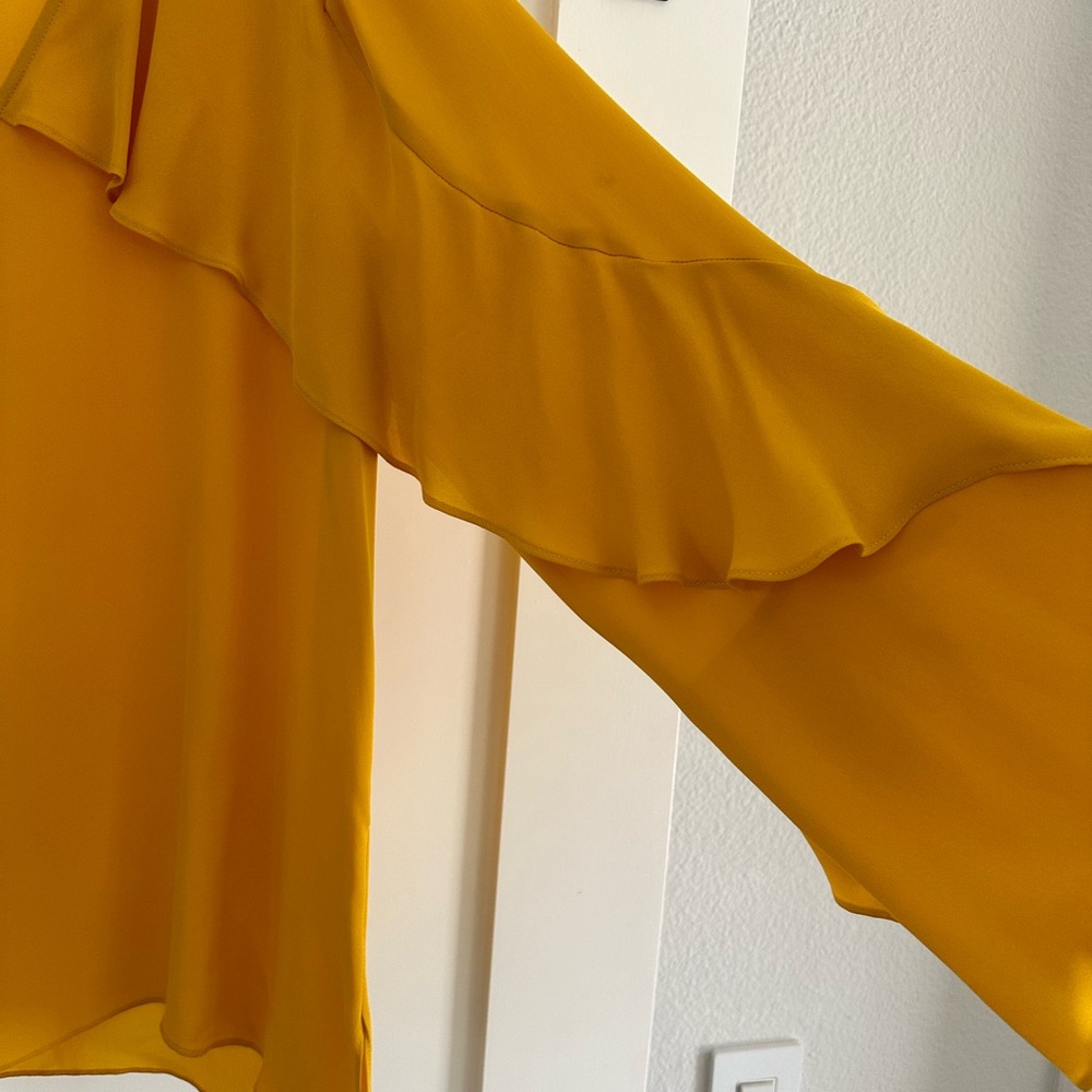 Silk yellow blouse. Worn once. No flaws.